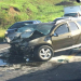 Batida mata um e deixa ferido na BR-101; frente de carro fica destruída
