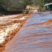 Rio Itapicuru transborda sobre ponte entre Araci e Tucano