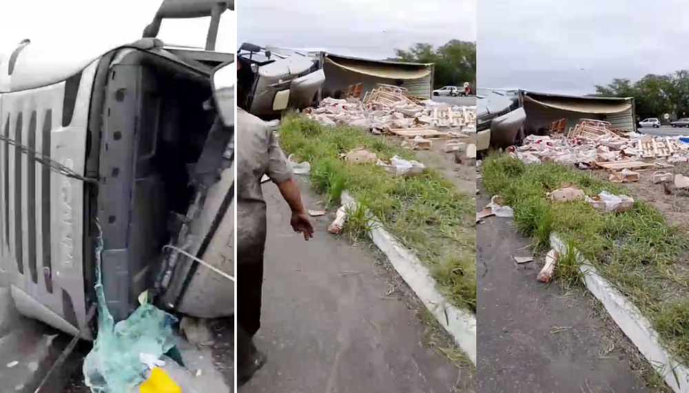 Carreta transportando carregamento de carne suína tomba na BR-116 Sul. Carga é saqueada