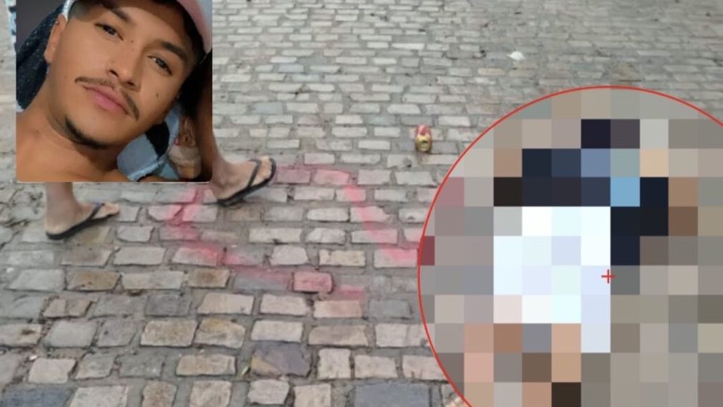 Jovem é morto a tiros em via pública e criminos escrevem as inciais de facção criminosa ao lado do corpo